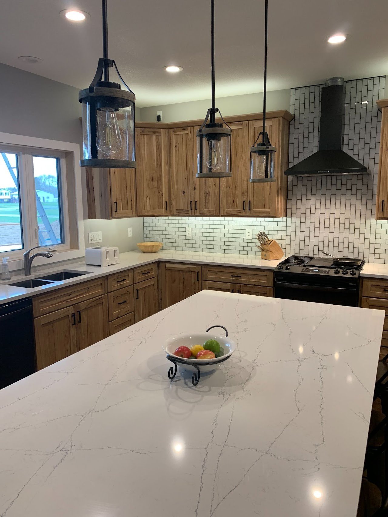 Custom natural oak kitchen cabinetry