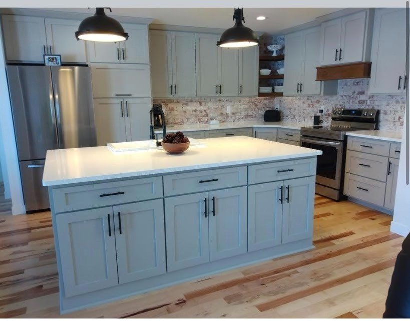 White painted kitchen with blue island