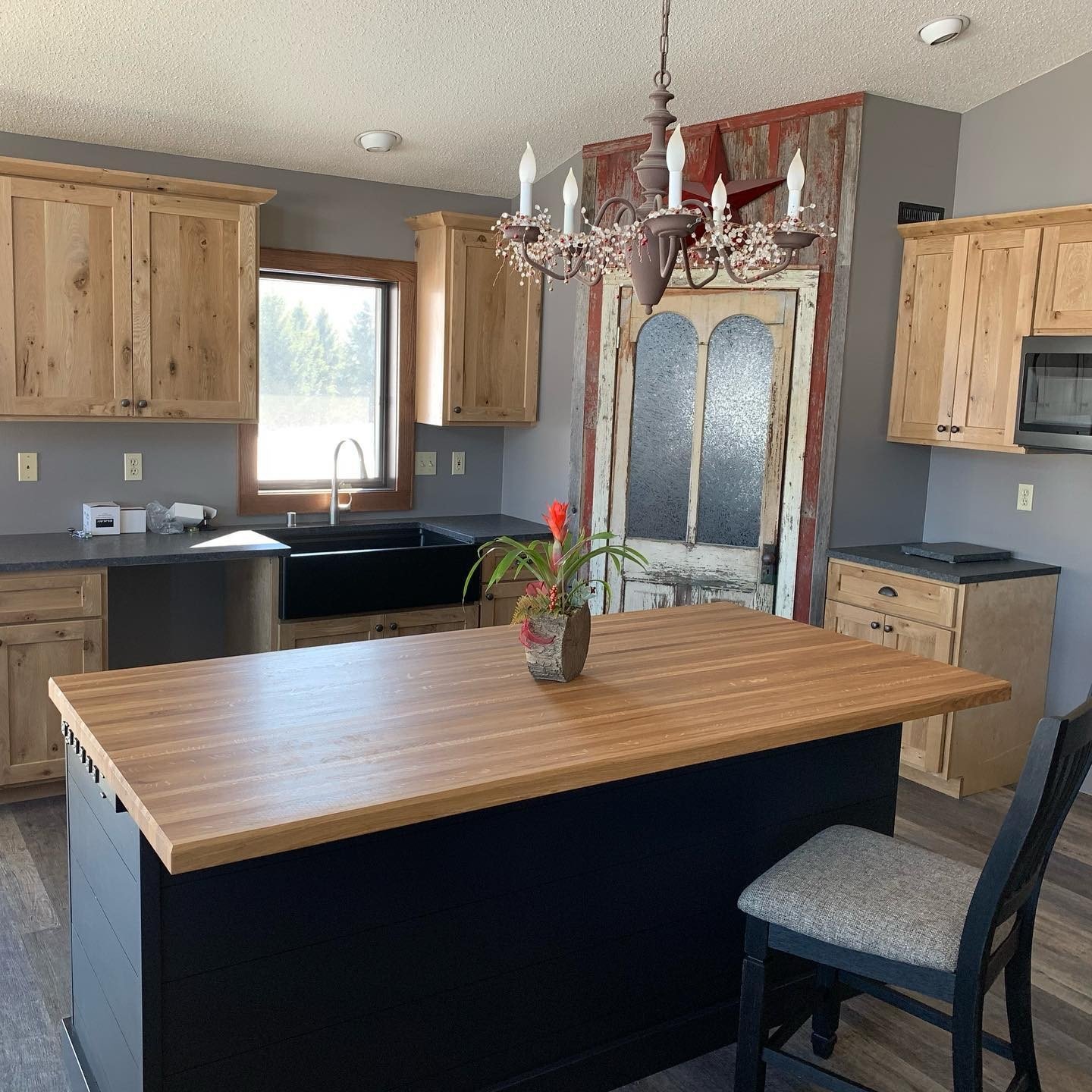 Wood kitchen with contrasting painted island