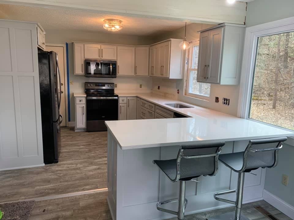 Light painted kitchen with large island