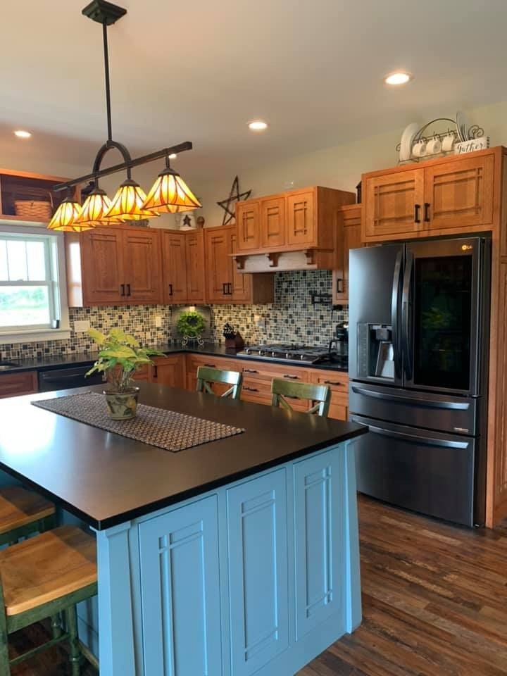 Wood kitchen with painted blue island